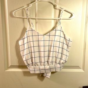 White sleeveless top